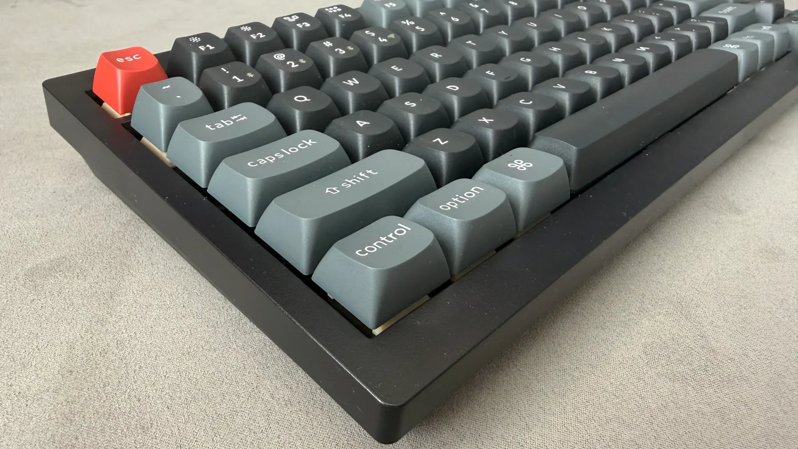 Keychron V1 Ultra 8K keyboard with hot-swappable switch sockets, shown in a sleek black color with illuminated keys