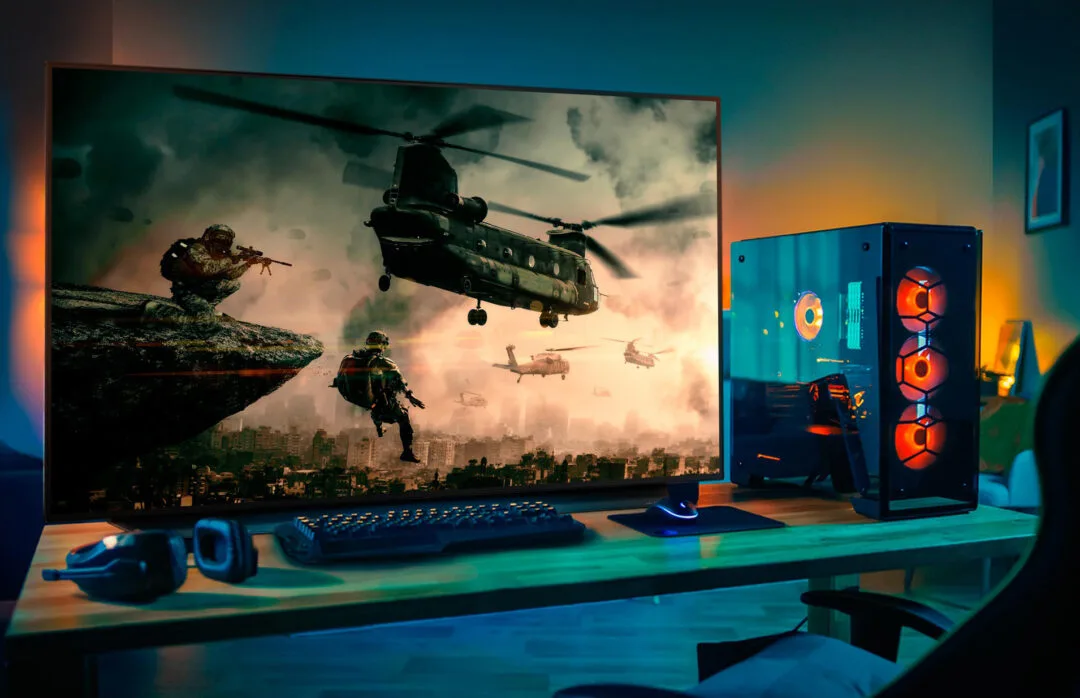 LG 48CX OLED monitor showing vivid colors on a dark gaming desktop setup