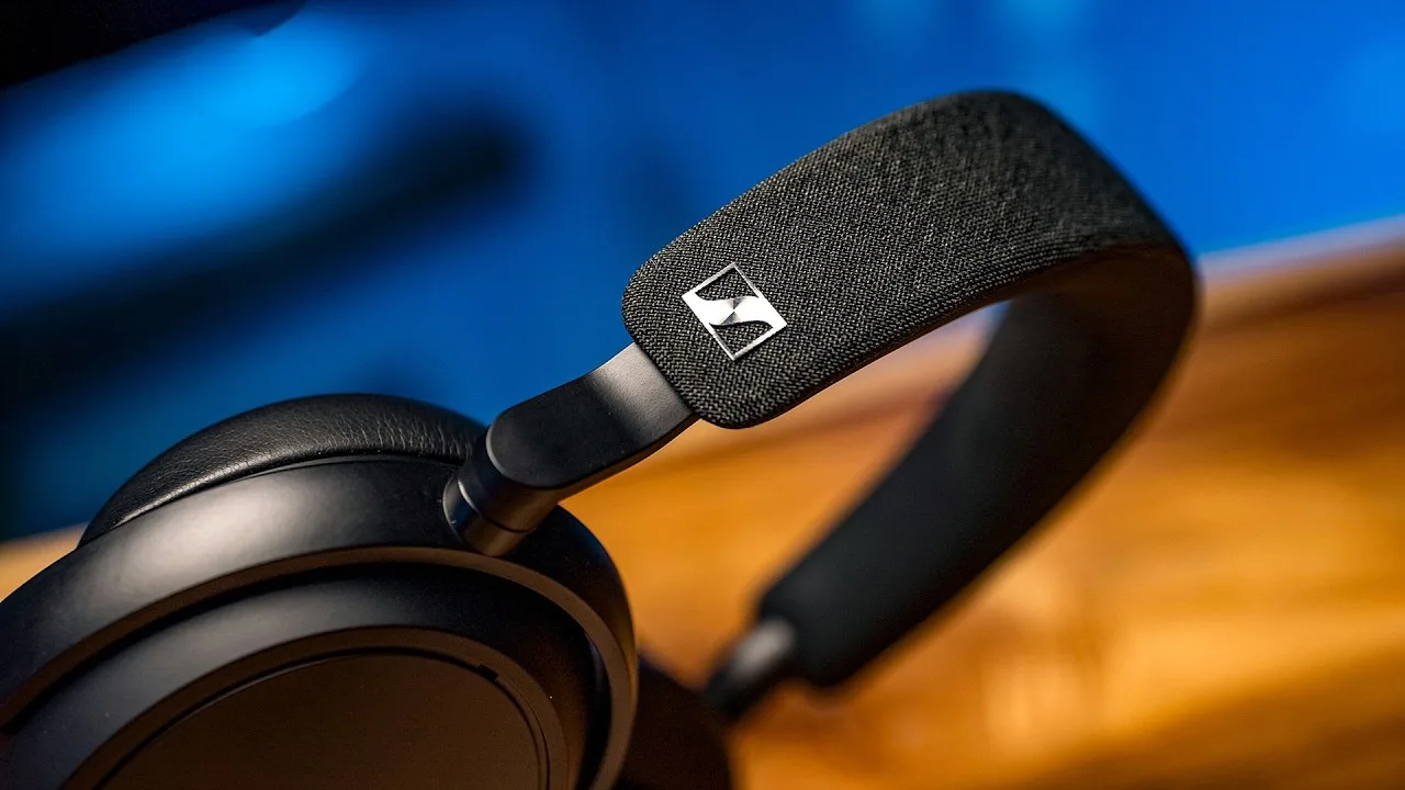 Sleek black Sennheiser Momentum 4 headphones with plush earcups and a sturdy build, known for their impressive battery life.